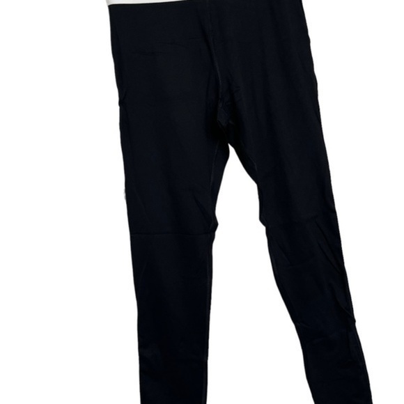 Pink Victoria’s Secret Womens active
Black Leggings with gold and white waist - Picture 4 of 6